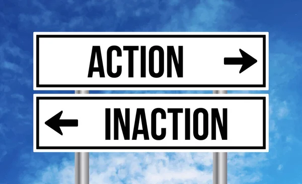 Action Inaction Road Sign Blue Sky Background — Stock Photo, Image