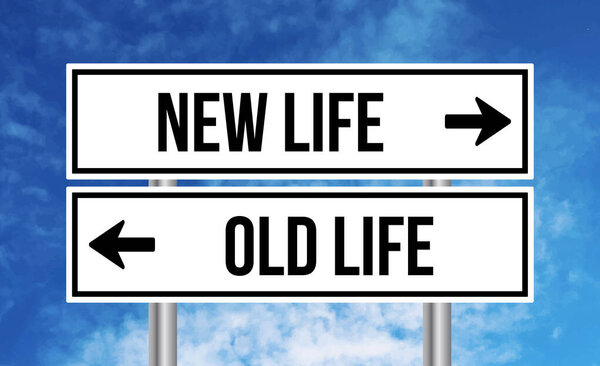 New life or old life road sign on blue sky background