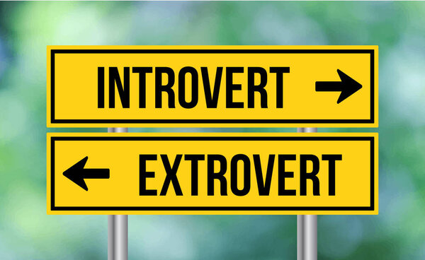 Introvert or extrovert road sign on blur background