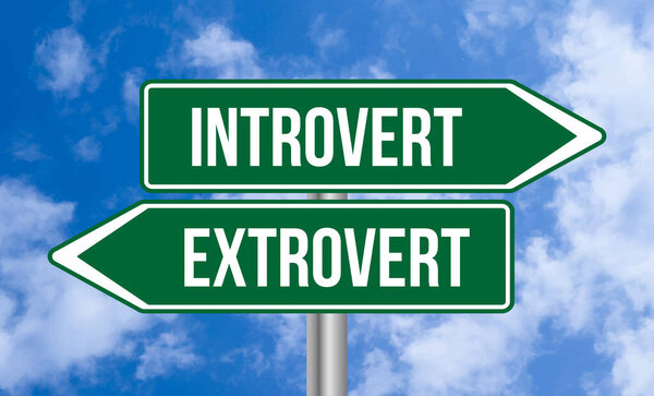 Introvert or extrovert road sign on sky background