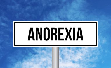 Mavi gökyüzü arka planında Anorexia yol işareti