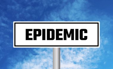 Gökyüzü arka planında salgın yol işareti