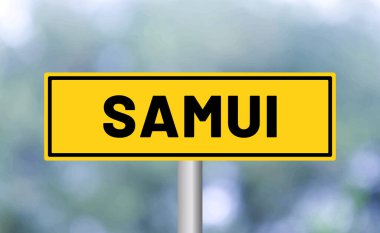 Bulanık arkaplanda Samui yol işareti