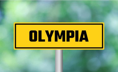 Arka planda Olympia yol tabelası