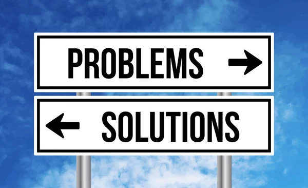 stock image Problems or solutions road sign on sky background