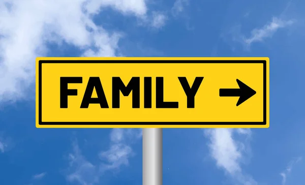 Family road sign on cloudy sky background