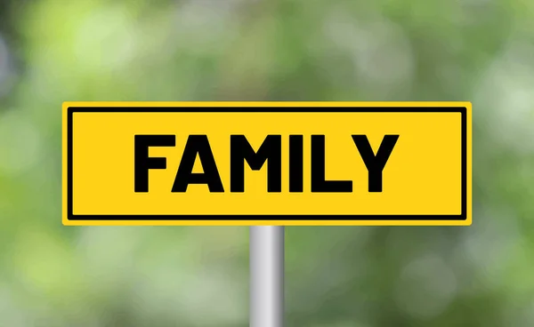 Family road sign on blur background