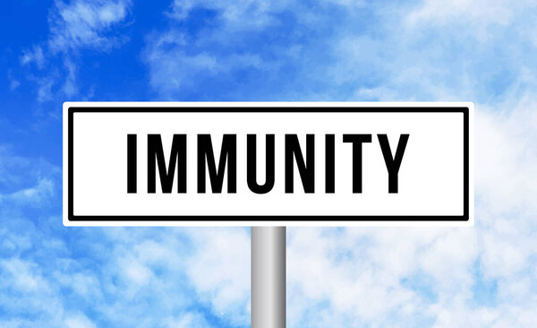Immunity road sign on sky background