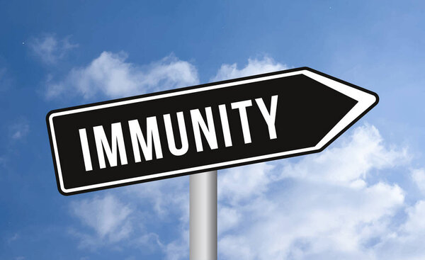 Immunity road sign on sky background
