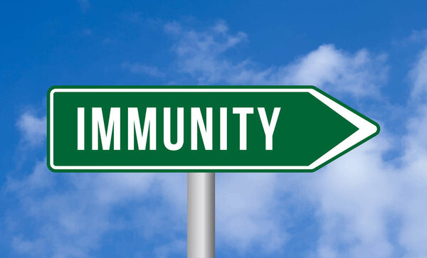 Immunity road sign on sky background