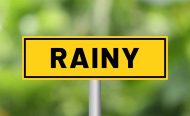 Bulanık arkaplanda yağmurlu yol işareti