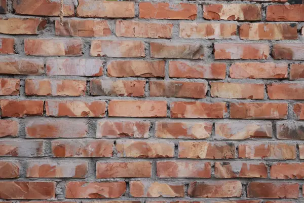 Ayrıntılı bir tuğla duvar yakalar, kabataslak, eski tuğlaların ve görünen havan hatlarının dokusunu vurgular, arka plan ve mimari unsurlar için uygundur..