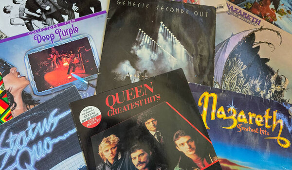 Top view of collection of old LP vinyl records with sleeves from various rock bands. August 18, 2025. Uberlingen, Germany.