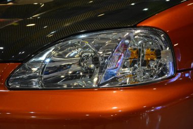 Pasay, PH - 13 Kasım 2021 'de Filipinler' in Pasay kentindeki Manila Oto Salonu 'nda Honda Civic' in farları. Manila Auto Salon, Filipinler 'de her yıl düzenlenen bir pazar sonrası araba fuarıdır..