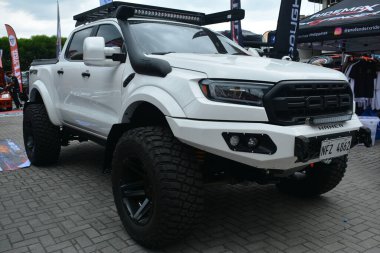 Pasay, PH-12 - Ford Ranger raptor 12 Aralık 2021 'de Pasay, Filipinler' de Bumper 'dan Bumper-16 araba fuarına geçti. Bumper to Bumper, tüm yıl boyunca Filipinler 'de düzenlenen bir otomobil fuarıdır..