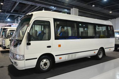 PASAY, PH - JULY 9 - JMC motors costar N7 bus at Manila commercial vehicle show on July 9, 2022 in Pasay, Philippines. Manila commercial vehicle show is a annual truck and bus show event held in Philippines.