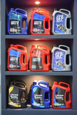 PASAY, PH - JULY 9 - Petron engine and gear oil at Manila commercial vehicle show on July 9, 2022 in Pasay, Philippines. Manila commercial vehicle show is a annual truck and bus show event held in Philippines.