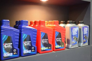 PASAY, PH - JULY 9 - Petron engine and gear oil at Manila commercial vehicle show on July 9, 2022 in Pasay, Philippines. Manila commercial vehicle show is a annual truck and bus show event held in Philippines.