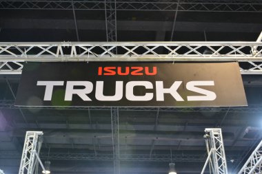 PASAY, PH - JULY 9 - Isuzu trucks signage at Manila commercial vehicle show on July 9, 2022 in Pasay, Philippines. Manila commercial vehicle show is a annual truck and bus show event held in Philippines.