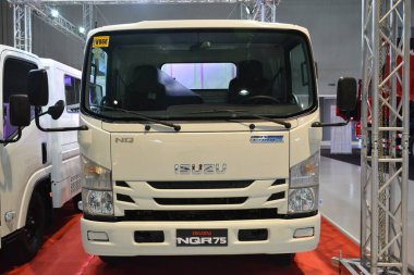 PASAY, PH - JULY 9 - Isuzu Nqr75 loading truck at Manila commercial vehicle show on July 9, 2022 in Pasay, Philippines. Manila commercial vehicle show is a annual truck and bus show event held in Philippines.
