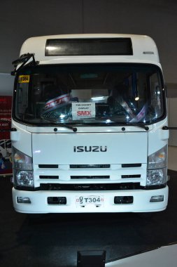 PASAY, PH - JULY 9 - Isuzu modern PUV at Manila commercial vehicle show on July 9, 2022 in Pasay, Philippines. Manila commercial vehicle show is a annual truck and bus show event held in Philippines.