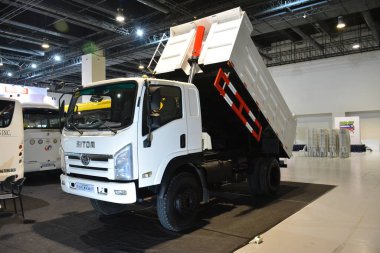PASAY, PH - JULY 9 - Sitom dumptruck at Manila commercial vehicle show on July 9, 2022 in Pasay, Philippines. Manila commercial vehicle show is a annual truck and bus show event held in Philippines.