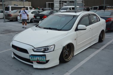 PARANAQUE, PH - AUG 20 - Mitsubishi lancer at crazy 4 doors on August 20, 2022 in Paranaque, Philippines. Crazy 4 doors is a car meet event held in Philippines.