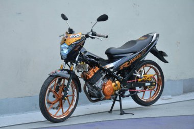 PARANAQUE, PH - FEB 11 - Suzuki r150 at overtake motor show in Paranaque, Philippines. Overtake is a motorcycle show held in Philippines