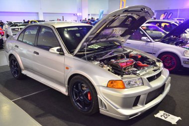 Pasay, PH - MAR 4 - Mitsubishi Lancer evrimi JDM Metro Araba Fuarı 'nda 4 Mart 2023 tarihinde Pasay, Filipinler' de gerçekleşti. JDM Underground, Filipinler 'de düzenlenen bir otomobil fuarıdır..