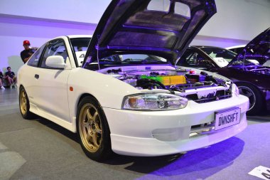 Pasay, PH - MAR 4 - Mitsubishi Lancer evrimi JDM Metro Araba Fuarı 'nda 4 Mart 2023 tarihinde Pasay, Filipinler' de gerçekleşti. JDM Underground, Filipinler 'de düzenlenen bir otomobil fuarıdır..