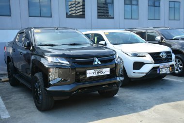 PASIG, PH - APR 30 - Mitsubishi strada 30 Nisan 2023 tarihinde Pasig, Filipinler 'de zevkle inşa edildi. Filipinler 'de zevkle yapılmış bir araba tanışma grubu var..