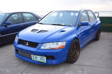 PARANAQUE, PH - 5 AUG Mitsubishi Lancer evolution at hoon fest car meet on 5 Ağustos 2023, Paranaque, Filipinler. Hoon Fest, Filipinler 'de düzenlenen bir pazar sonrası araba yarışması..