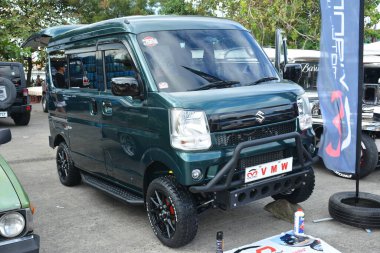 Pasay, PH-DEC 2 - Suzuki apv Bumper 'dan Bumper' a 19 Aralık 2023, Pasay, Filipinler. Bumper to Bumper, Filipinler 'de düzenlenen bir otomobil fuarıdır..