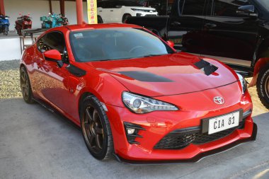 CAINTA, PH-30 - Toyota 86 30 Aralık 2023 tarihinde Cainta, Filipinler 'de VIP araba fuarında. VIP, Filipinler 'de düzenlenen bir otomobil fuarıdır..