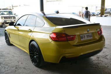 CAINTA, PH - 30 DEC - Bmw f80 m3 30 Aralık 2023 tarihinde Cainta, Filipinler 'de VIP araba fuarında. VIP, Filipinler 'de düzenlenen bir otomobil fuarıdır..