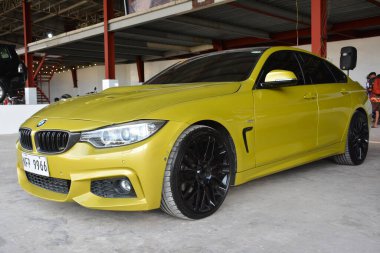 CAINTA, PH - 30 DEC - Bmw f80 m3 30 Aralık 2023 tarihinde Cainta, Filipinler 'de VIP araba fuarında. VIP, Filipinler 'de düzenlenen bir otomobil fuarıdır..