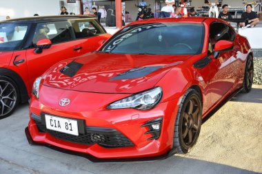 CAINTA, PH-30 - Toyota 86 30 Aralık 2023 tarihinde Cainta, Filipinler 'de VIP araba fuarında. VIP, Filipinler 'de düzenlenen bir otomobil fuarıdır..