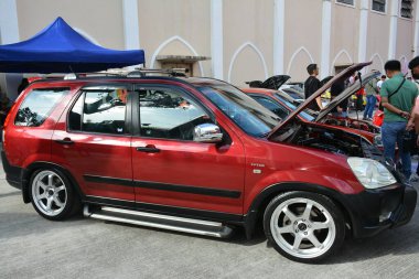 MANILA, PH-JAN 27 - 27 Ocak 2024 'te Manila, Filipinler' de Revolve Car Show 'da Honda crv. Revolve, Filipinler 'de San Beda Üniversitesi' nde düzenlenen yıllık bir otomobil fuarıdır..