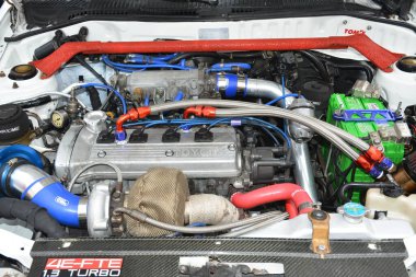 MANILA, PH-JAN 27 - Toyota yıldız motoru 27 Ocak 2024 tarihinde Manila, Filipinler 'de Revolve Car Show' da. Revolve, Filipinler 'de San Beda Üniversitesi' nde düzenlenen yıllık bir otomobil fuarıdır..