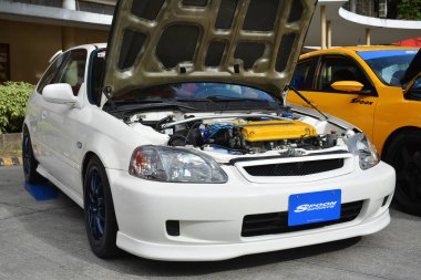 MANILA, PH-JAN 27 - Honda civic spoon sporları Revolve Car Show 'da 27 Ocak 2024 tarihinde Manila, Filipinler' de. Revolve, Filipinler 'de San Beda Üniversitesi' nde düzenlenen yıllık bir otomobil fuarıdır..