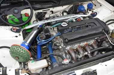 MANILA, PH-JAN 27 - 27 Ocak 2024 tarihinde Manila, Filipinler 'de Revolve Car Show' da Honda sivil motoru. Revolve, Filipinler 'de San Beda Üniversitesi' nde düzenlenen yıllık bir otomobil fuarıdır..