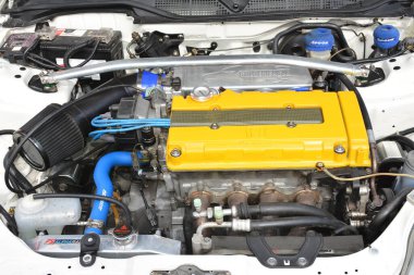 MANILA, PH-JAN 27 - 27 Ocak 2024 tarihinde Manila, Filipinler 'de Revolve Car Show' da Honda sivil motoru. Revolve, Filipinler 'de San Beda Üniversitesi' nde düzenlenen yıllık bir otomobil fuarıdır..