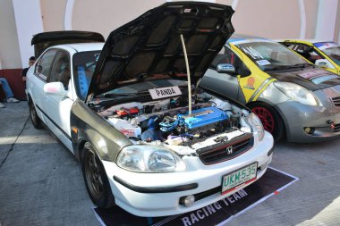 MANILA, PH-27 Ocak 2024 'te Manila, Filipinler' de Revolve Car Show 'da Honda civic. Revolve, Filipinler 'de San Beda Üniversitesi' nde düzenlenen yıllık bir otomobil fuarıdır..