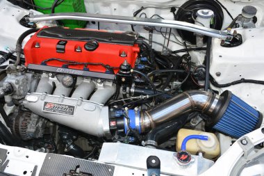 MANILA, PH-JAN 27 - 27 Ocak 2024 tarihinde Manila, Filipinler 'de Revolve Car Show' da Honda sivil motoru. Revolve, Filipinler 'de San Beda Üniversitesi' nde düzenlenen yıllık bir otomobil fuarıdır..