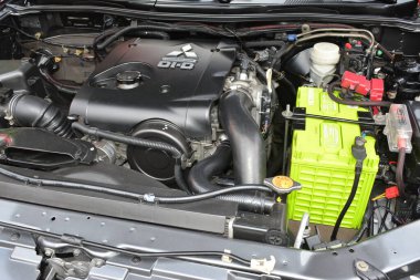 MANILA, PH - JAN 27 - Mitsubishi strada motoru 27 Ocak 2024 tarihinde Manila, Filipinler 'de Revolve Car Show' da. Revolve, Filipinler 'de San Beda Üniversitesi' nde düzenlenen yıllık bir otomobil fuarıdır..