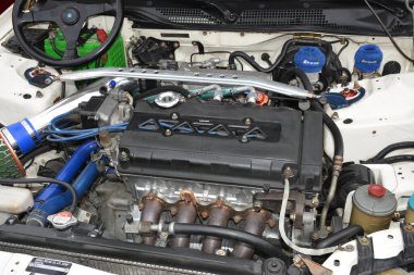 MANILA, PH-JAN 27 - 27 Ocak 2024 tarihinde Manila, Filipinler 'de Revolve Car Show' da Honda sivil motoru. Revolve, Filipinler 'de San Beda Üniversitesi' nde düzenlenen yıllık bir otomobil fuarıdır..