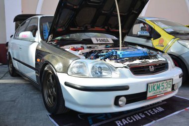 MANILA, PH-27 Ocak 2024 'te Manila, Filipinler' de Revolve Car Show 'da Honda civic. Revolve, Filipinler 'de San Beda Üniversitesi' nde düzenlenen yıllık bir otomobil fuarıdır..