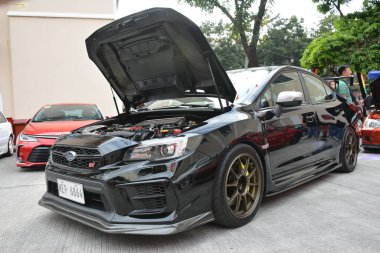 MANILA, PH - JAN 27 - Revolve Car Show 'da 27 Ocak 2024 tarihinde Manila, Filipinler' de Subaru. Revolve, Filipinler 'de San Beda Üniversitesi' nde düzenlenen yıllık bir otomobil fuarıdır..