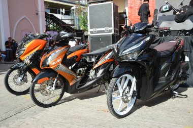 MANILA, PH - JAN 27 - 27 Ocak 2024 tarihinde Manila, Filipinler 'de Revolve Car Show' da Honda tıkladı. Revolve, Filipinler 'de San Beda Üniversitesi' nde düzenlenen yıllık bir otomobil fuarıdır..