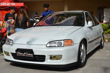 MANILA, PH-27 Ocak 2024 'te Manila, Filipinler' de Revolve Car Show 'da Honda civic. Revolve, Filipinler 'de San Beda Üniversitesi' nde düzenlenen yıllık bir otomobil fuarıdır..